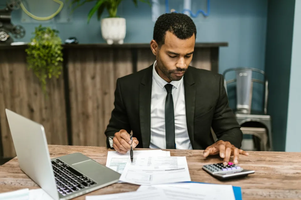 accountant working intently at his desk