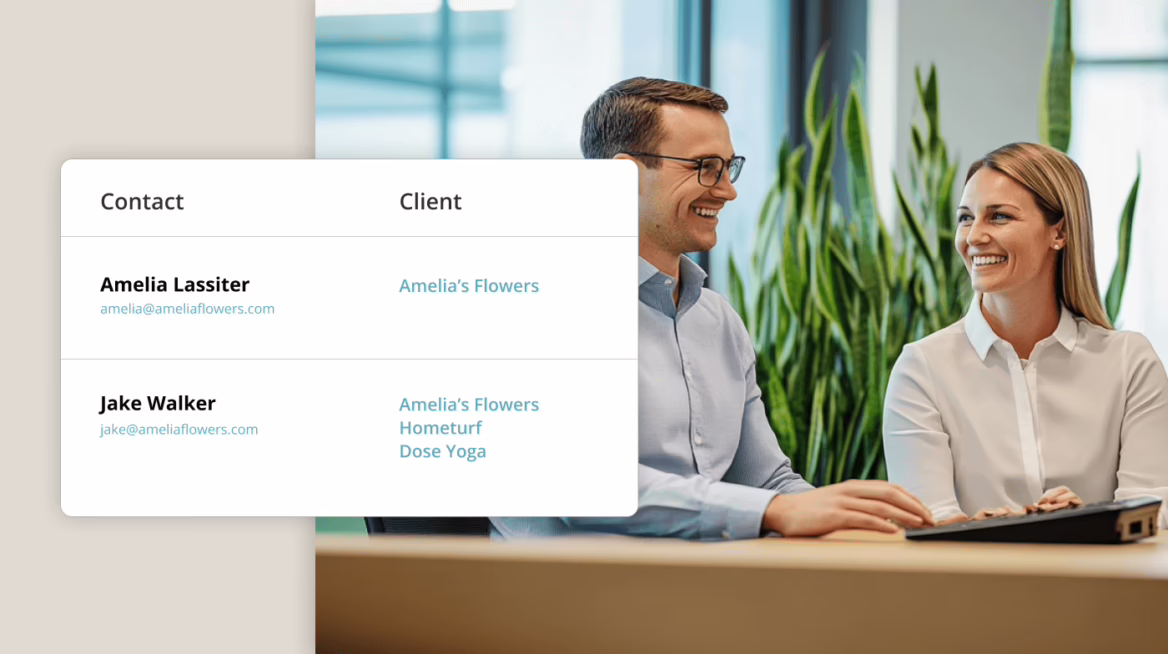 Two professionals reviewing client information in the Firm360 accounting software interface